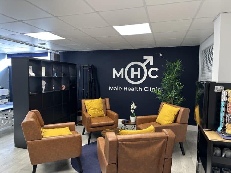 Home 20 Modern male health clinic lounge with comfortable chairs and vibrant decor.